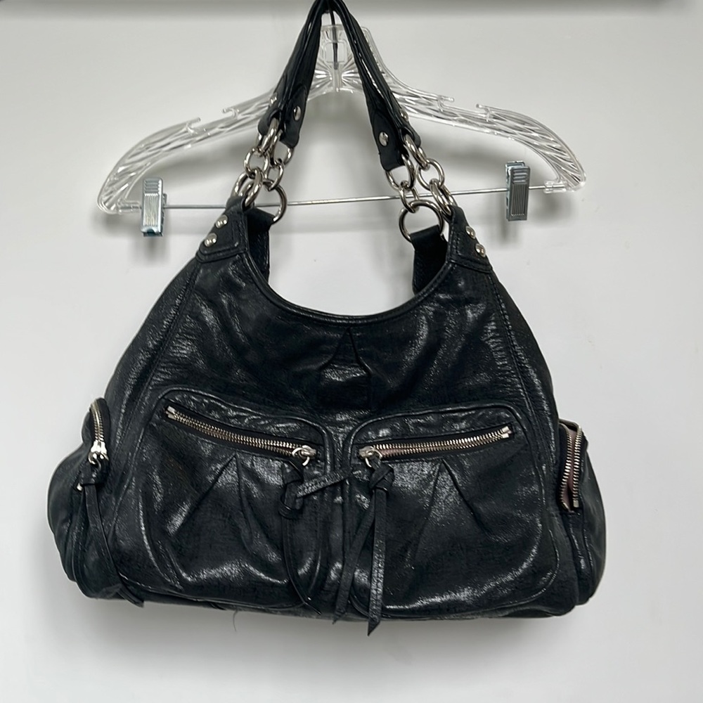 Authentic Coach hobo purse; Comag USA pat. 5722126